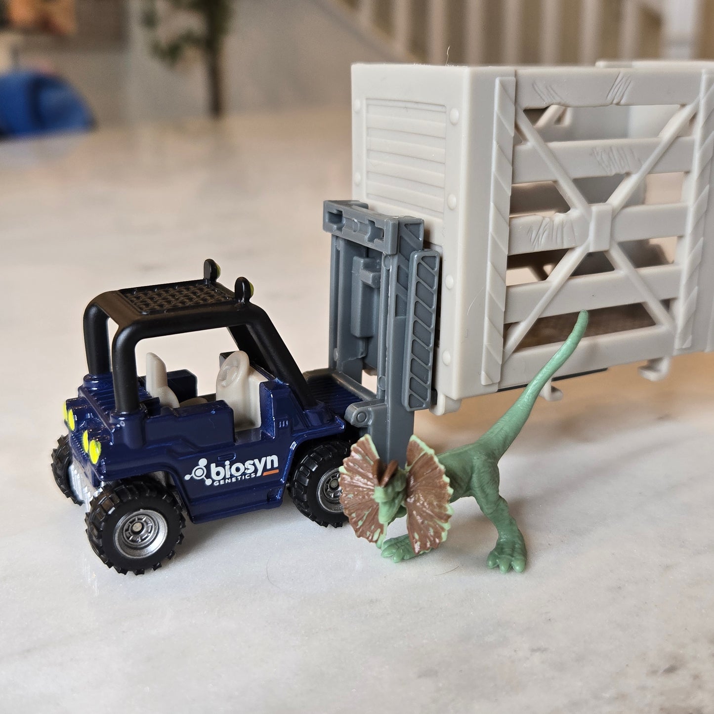 mini dilophosaurus + truck
