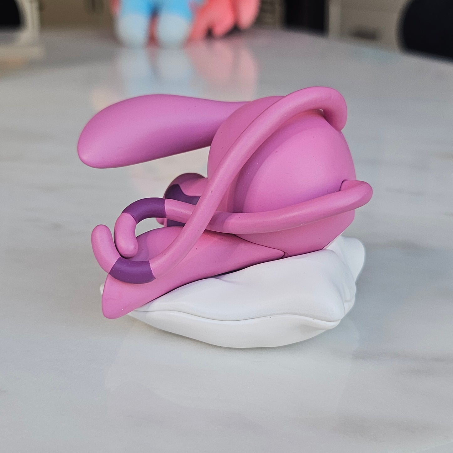 sleeping pink dog popmart figure