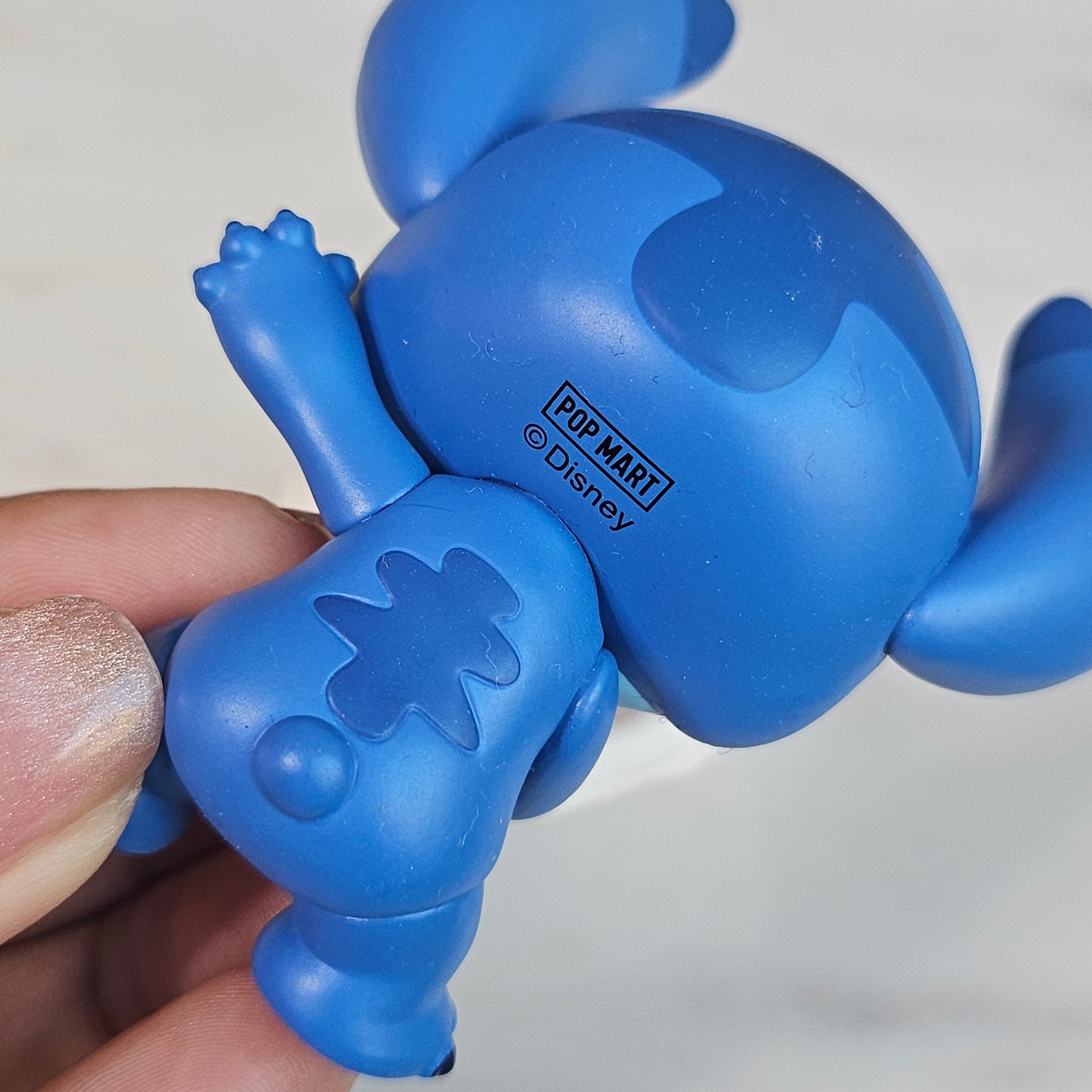 sleeping blue dog popmart figure