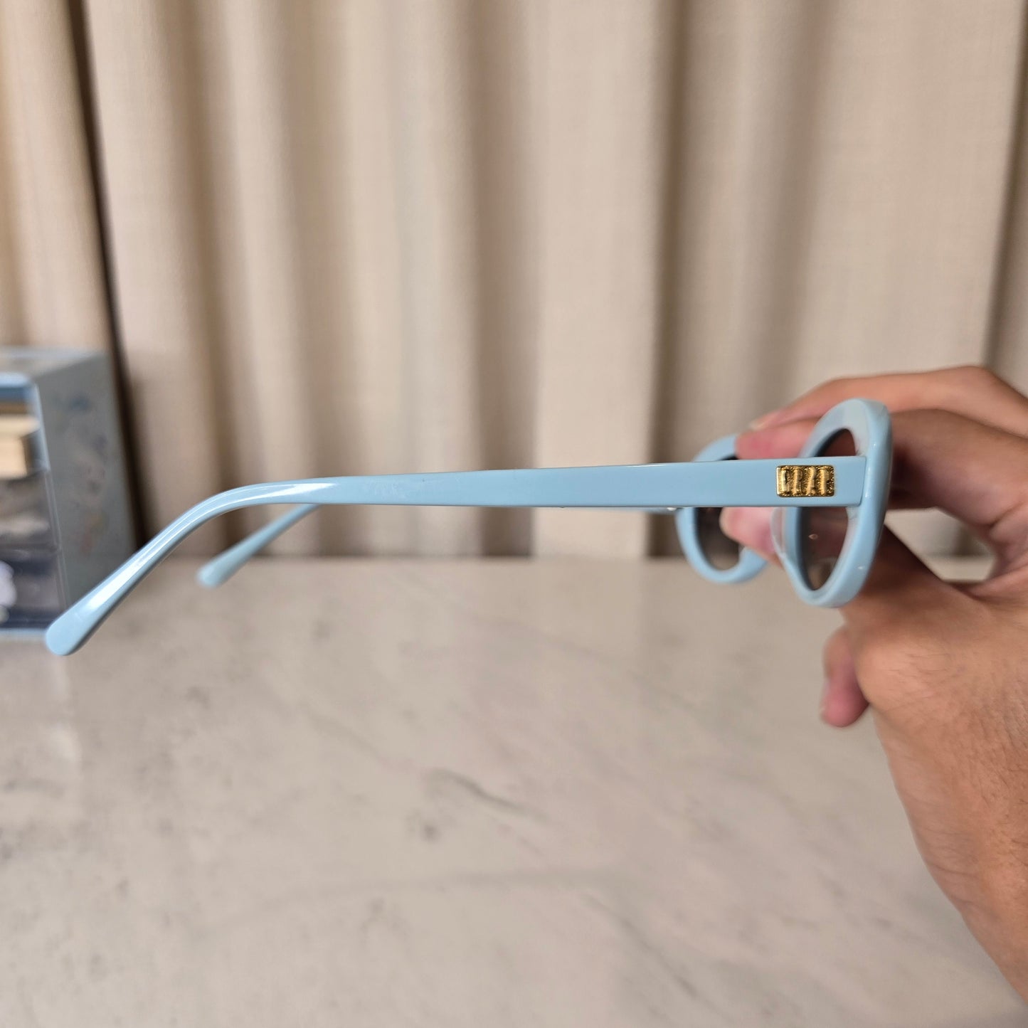 blue oval sunnies
