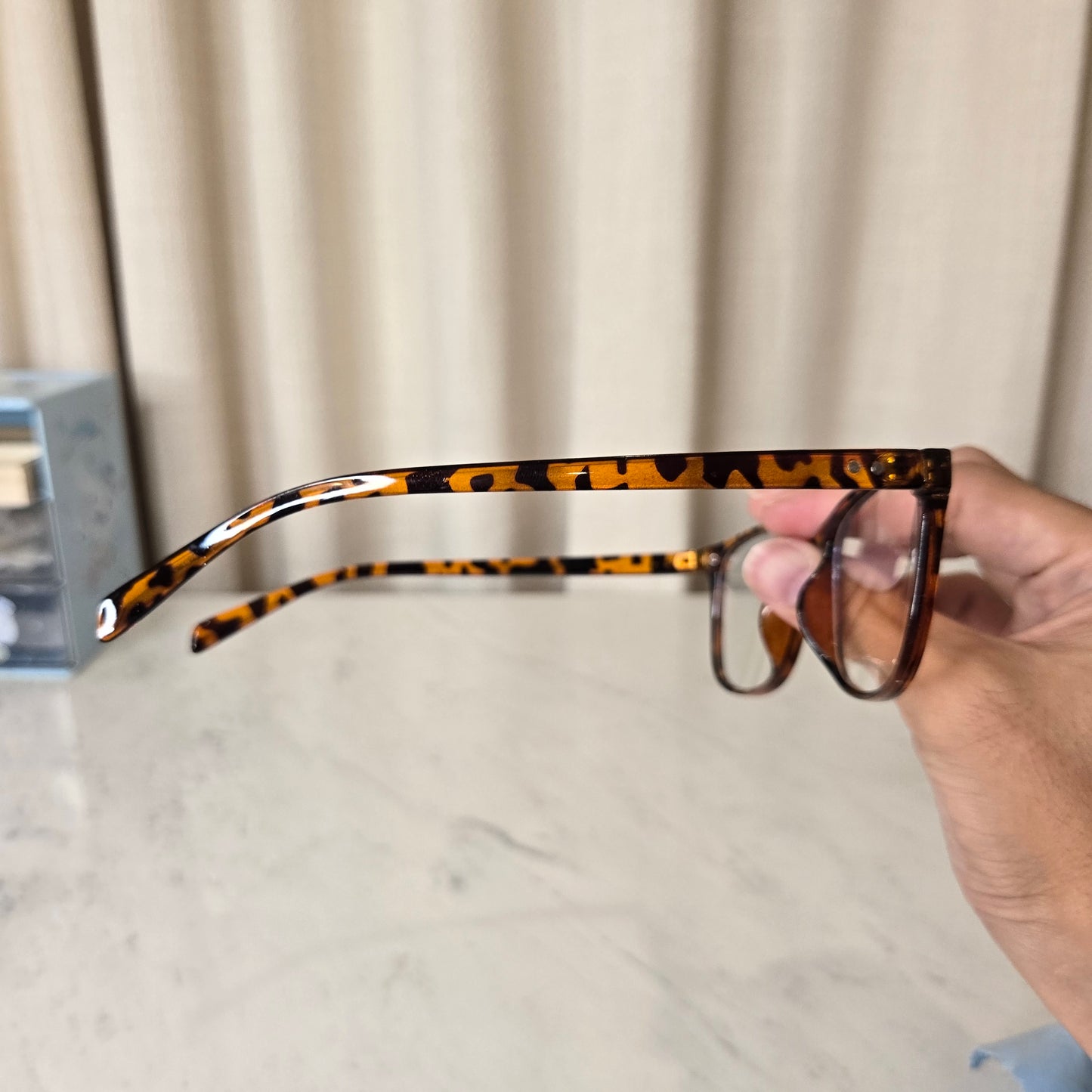 brown glasses