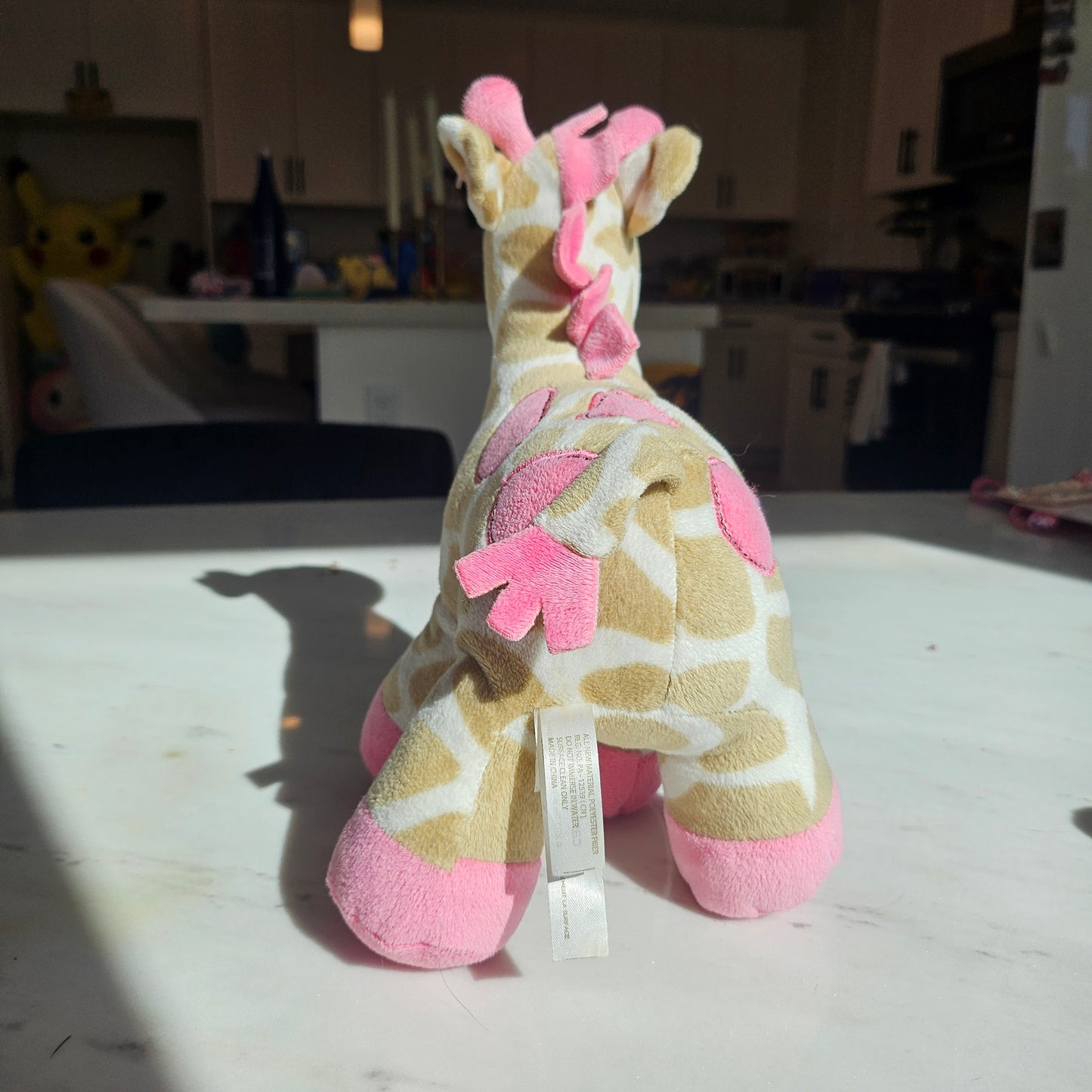 pink giraffe plushie