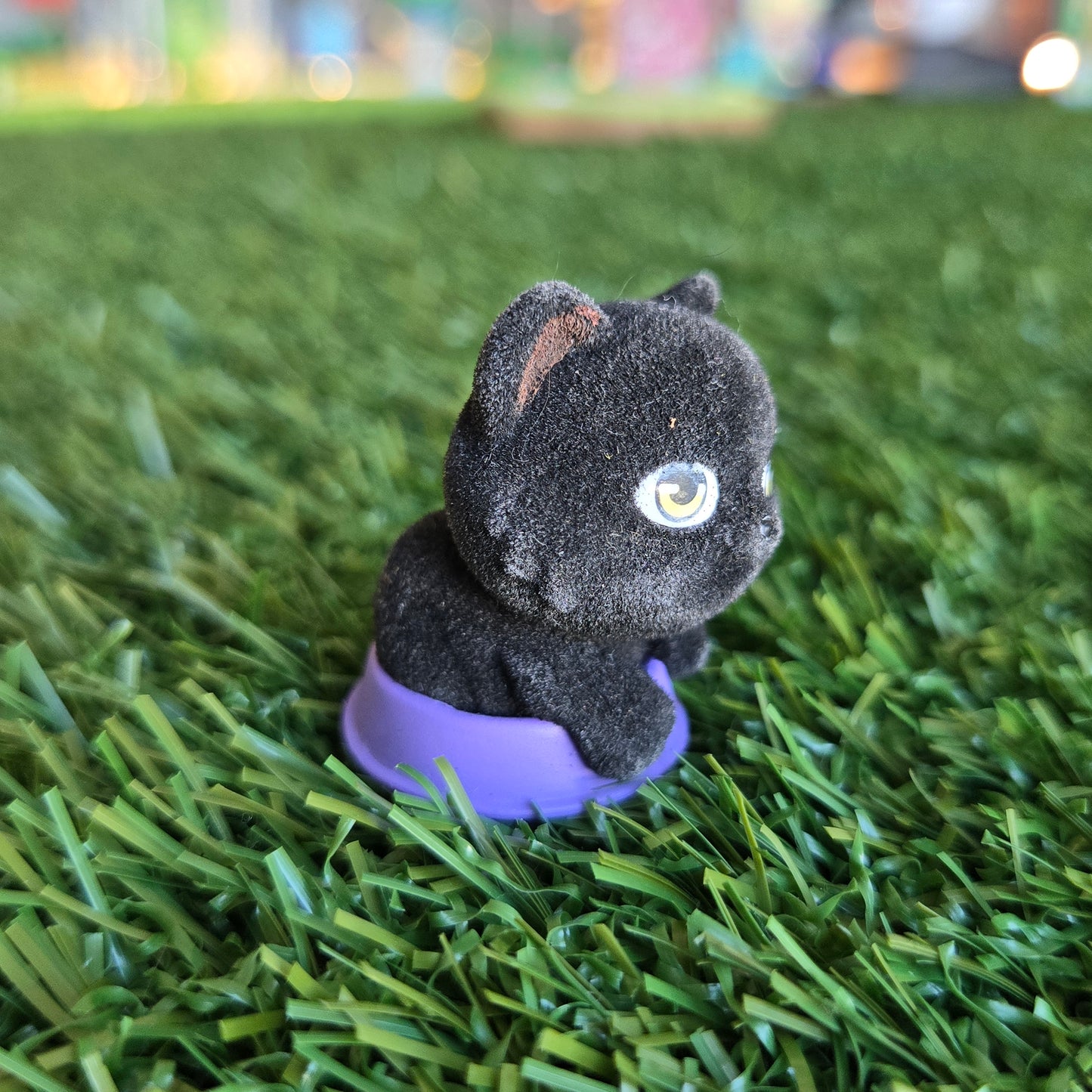 black cat in food bowl figure