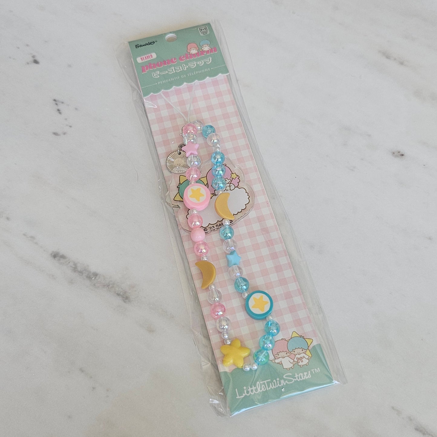 star twins phone charm