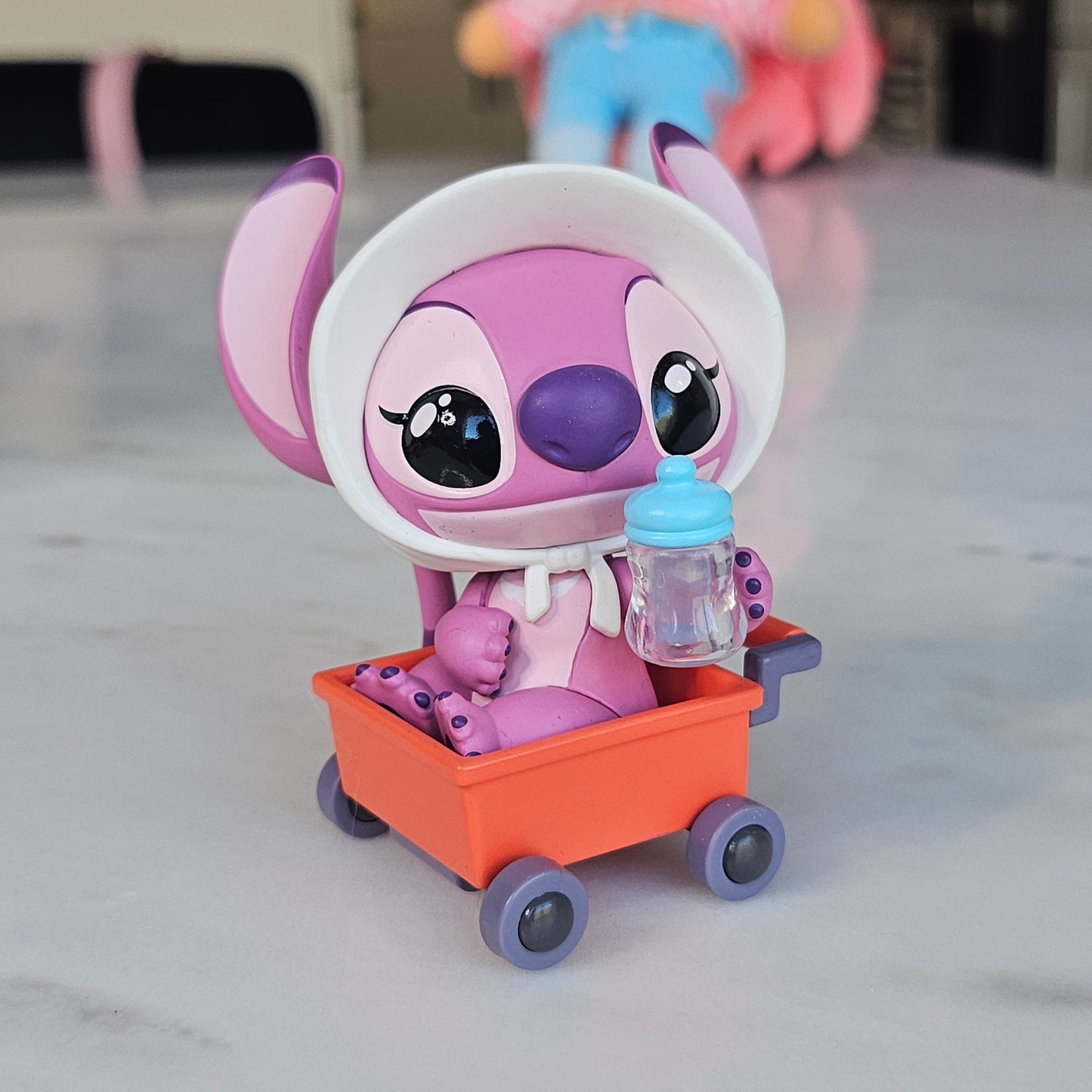 baby pink dog popmart figure