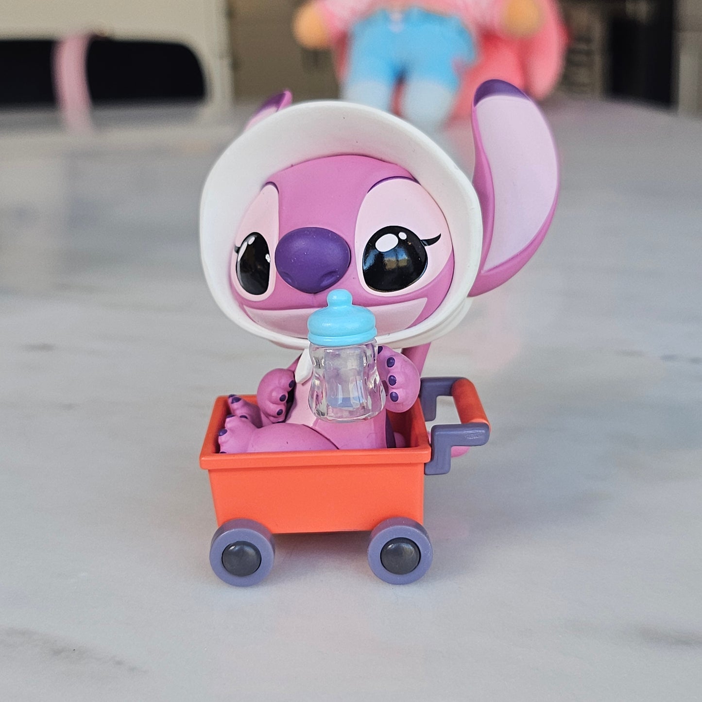 baby pink dog popmart figure