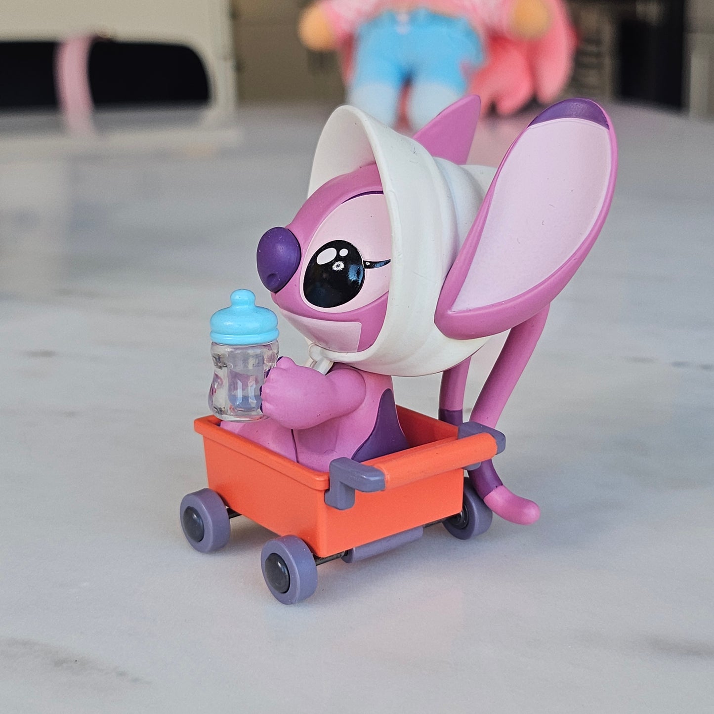 baby pink dog popmart figure