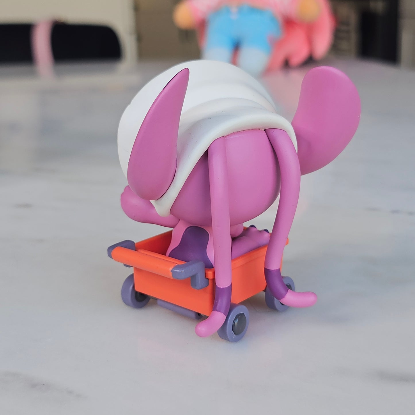 baby pink dog popmart figure