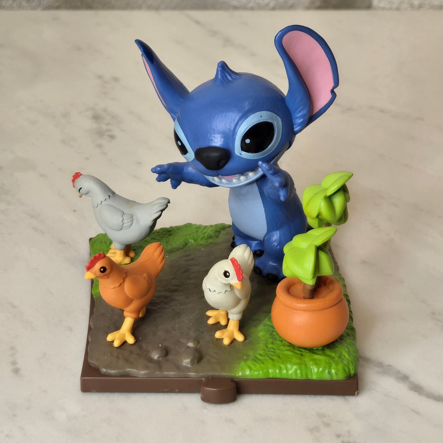 blue dog figure (chicken)