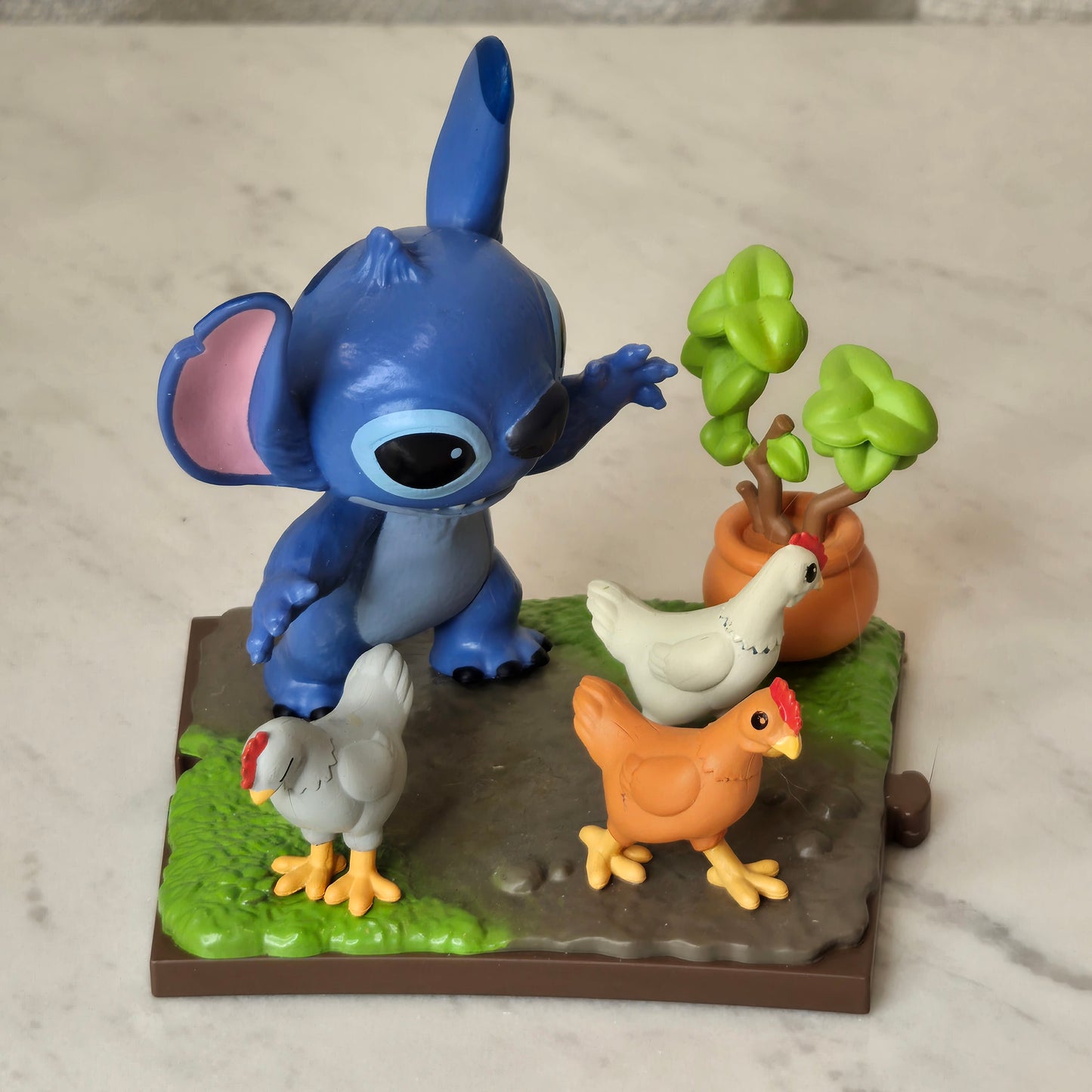 blue dog figure (chicken)