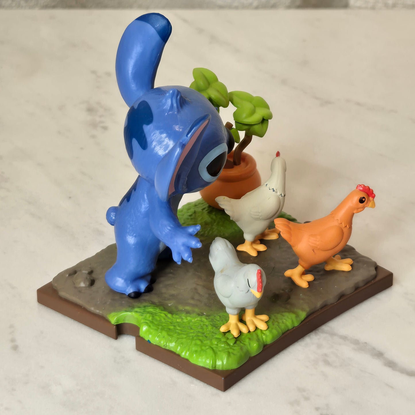 blue dog figure (chicken)