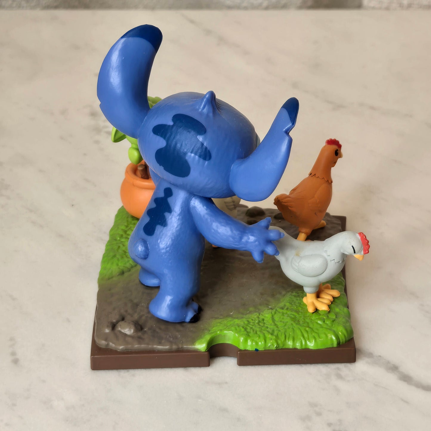 blue dog figure (chicken)