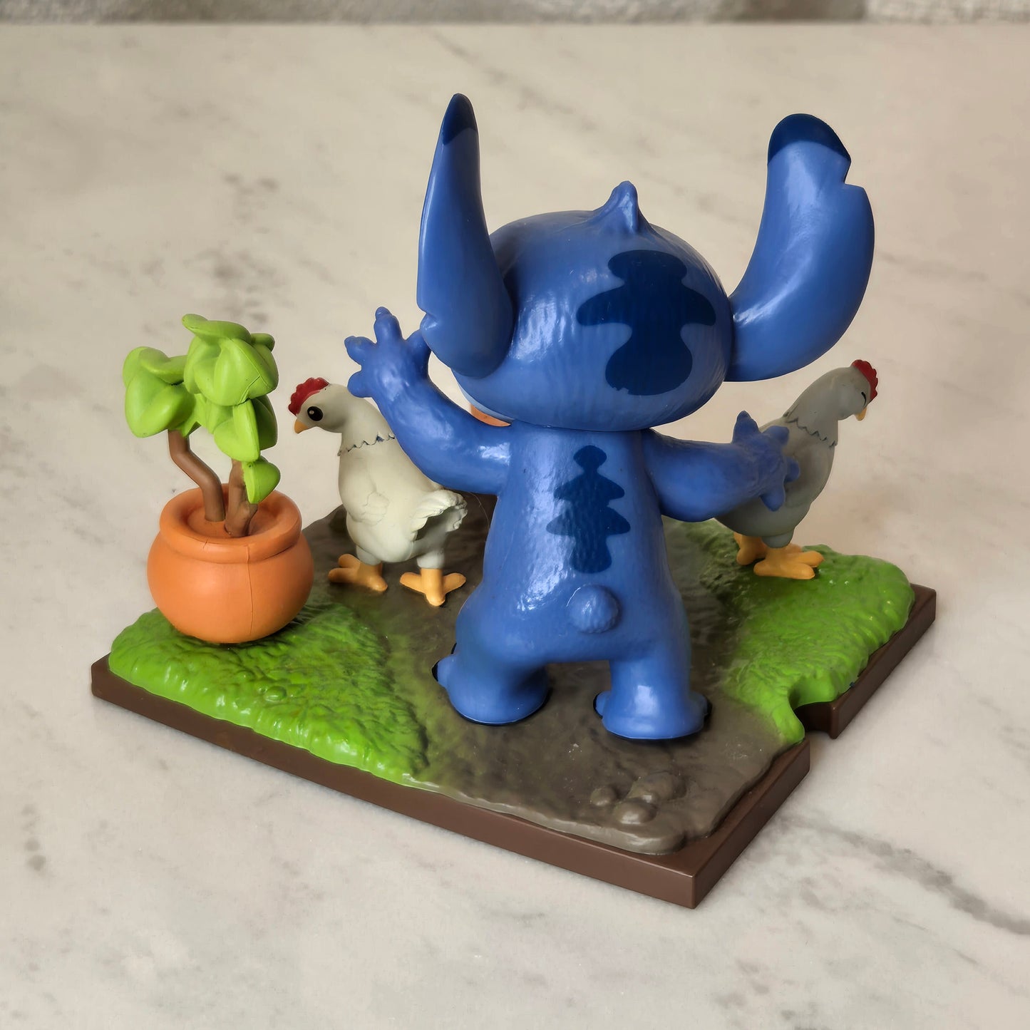 blue dog figure (chicken)