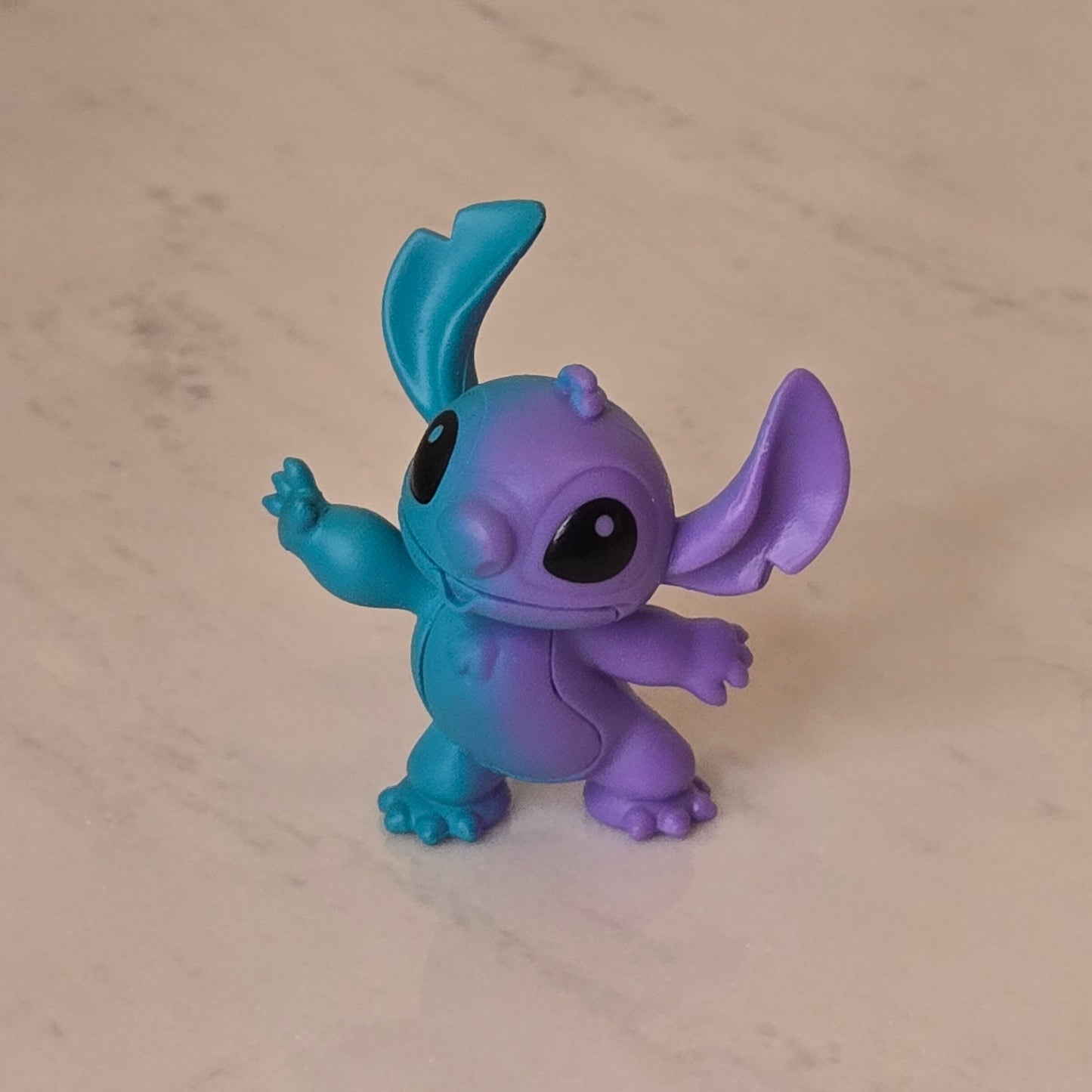blue dog figure (blue and purple)