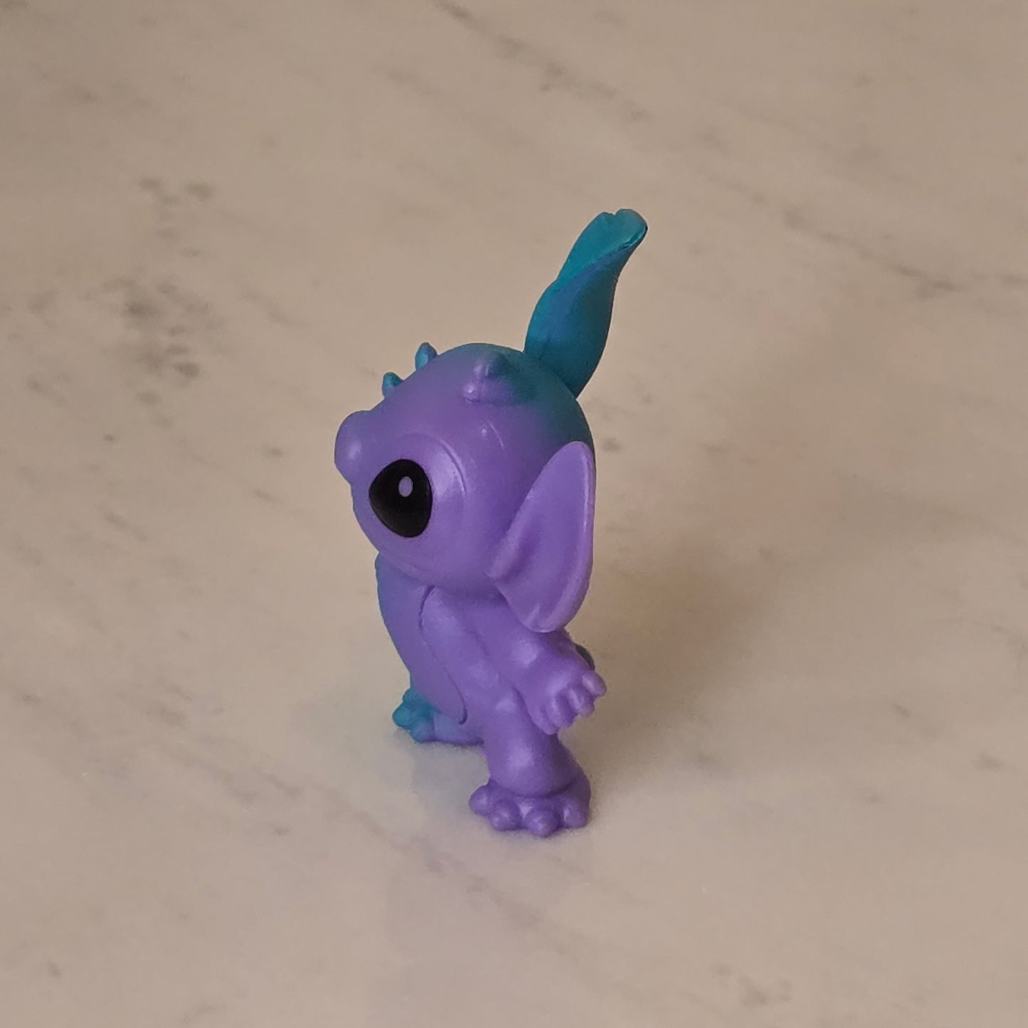 blue dog figure (blue and purple)