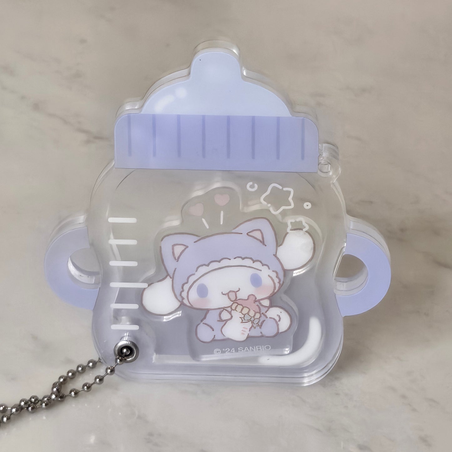 flying puppy baby bottle keychain