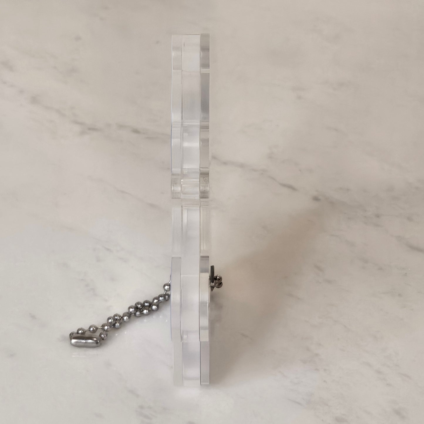 flying puppy baby bottle keychain