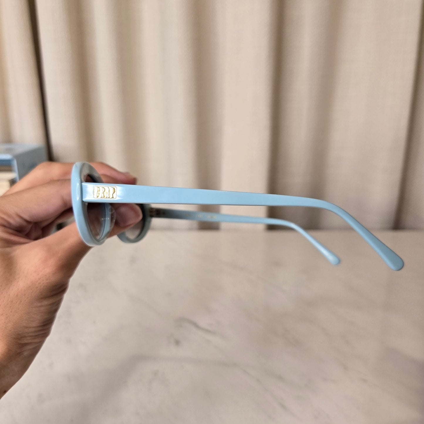 blue oval sunnies