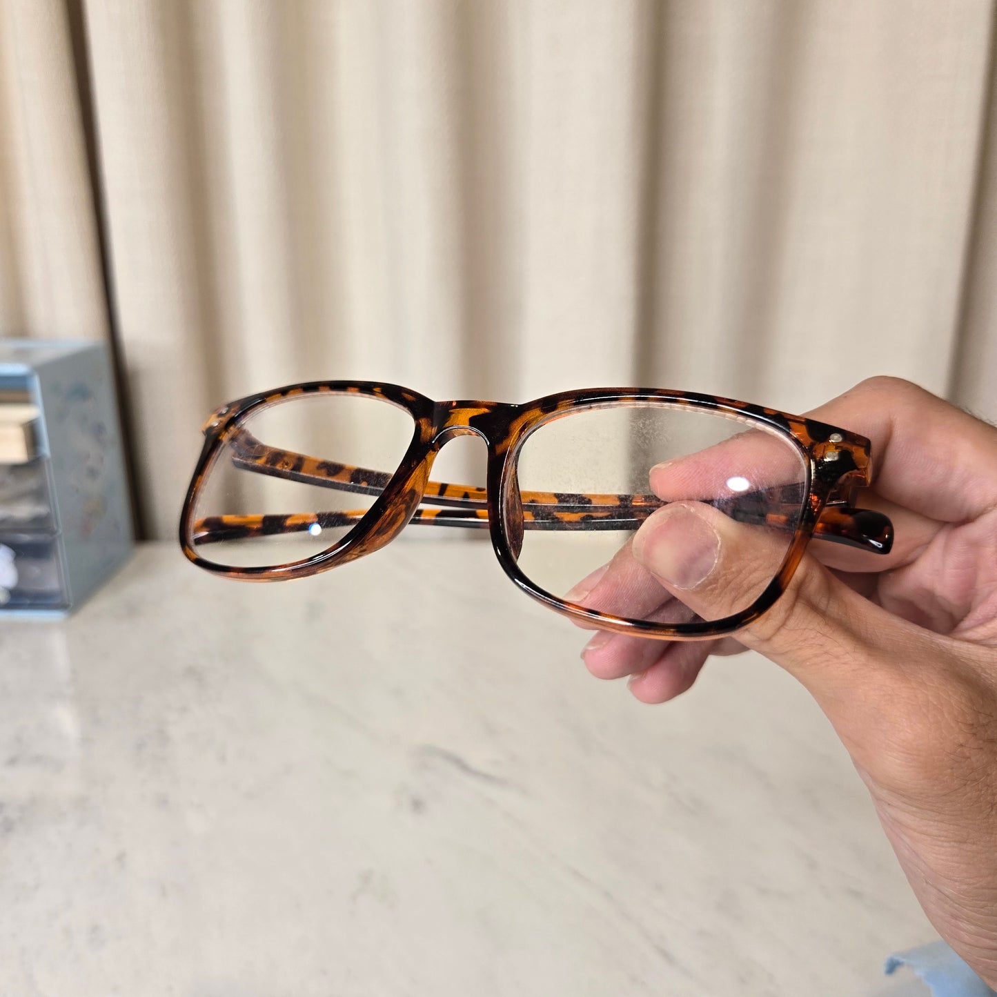 brown glasses
