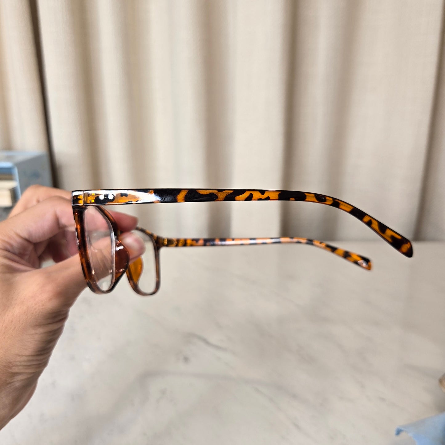 brown glasses