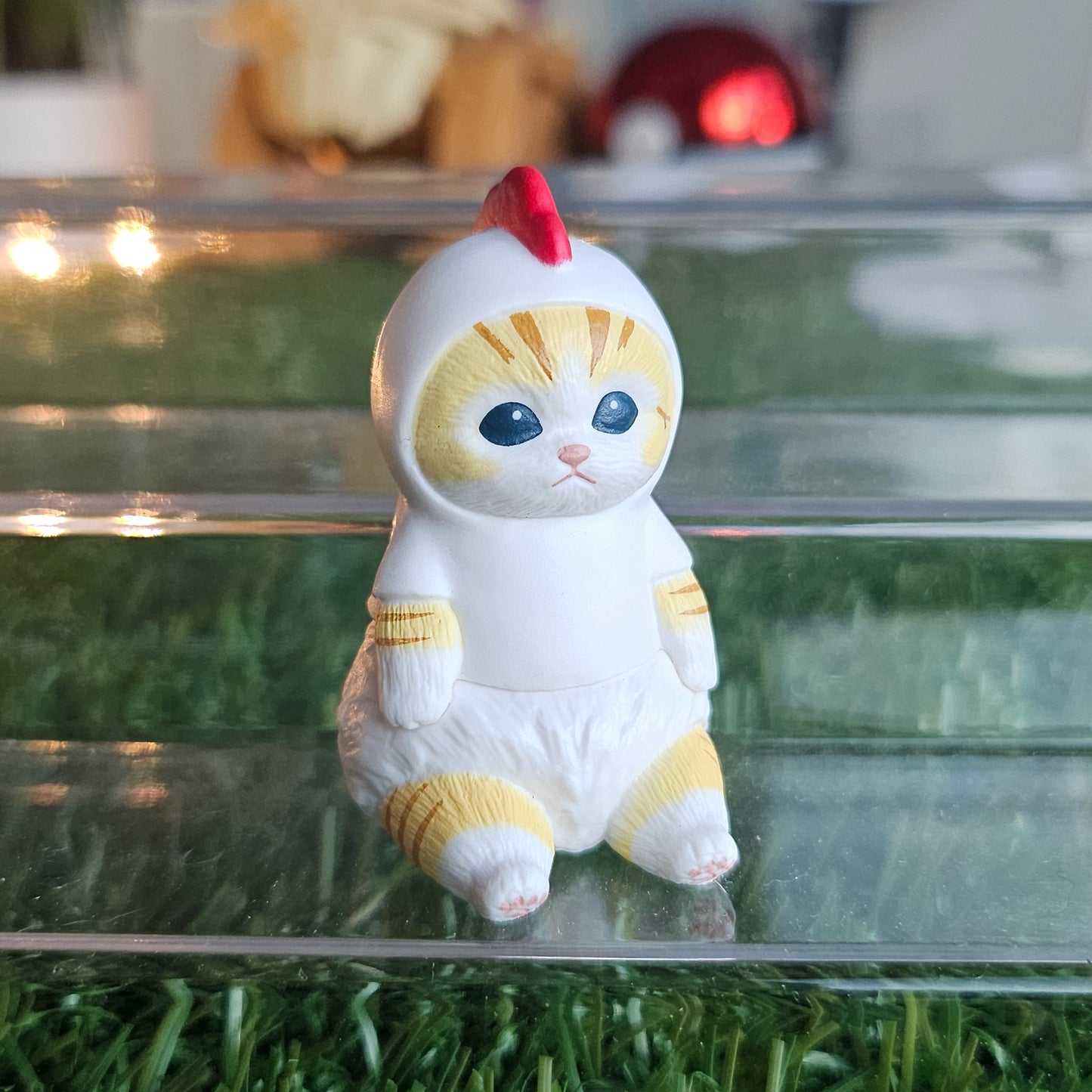 sitting chicken mofusand cat