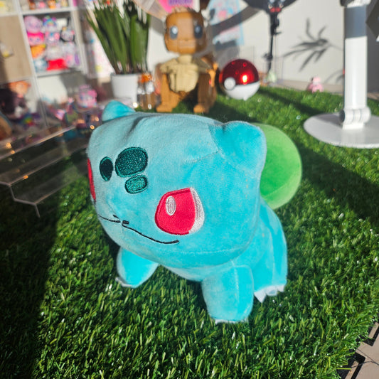 grass dino with bulb plushie