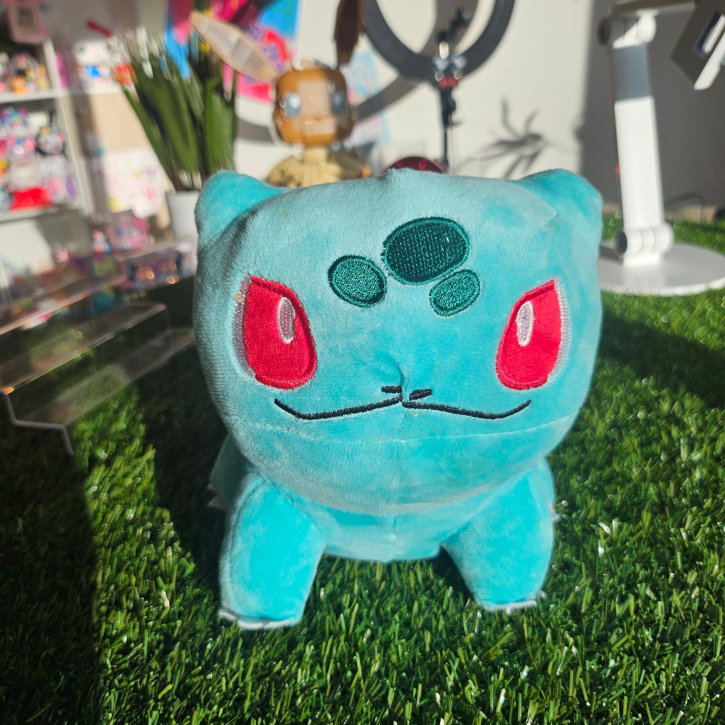 grass dino with bulb plushie