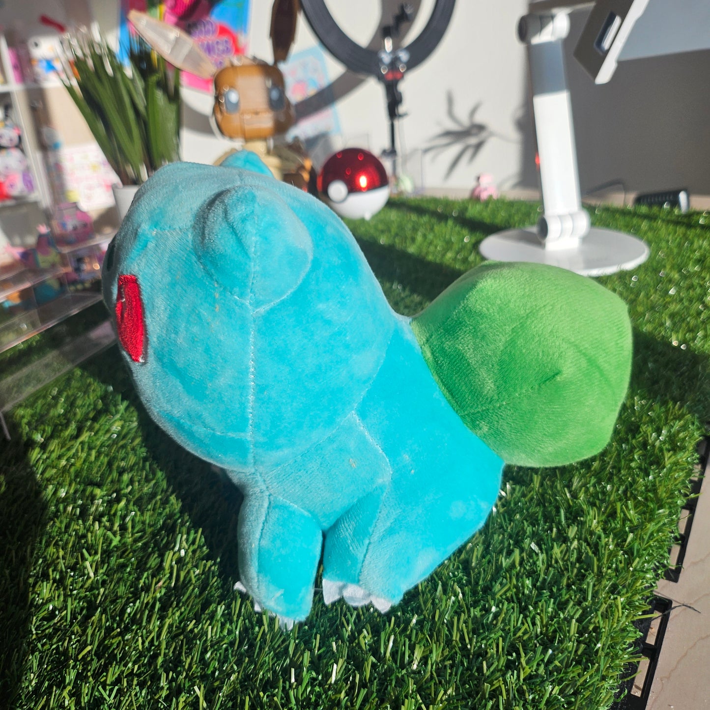grass dino with bulb plushie