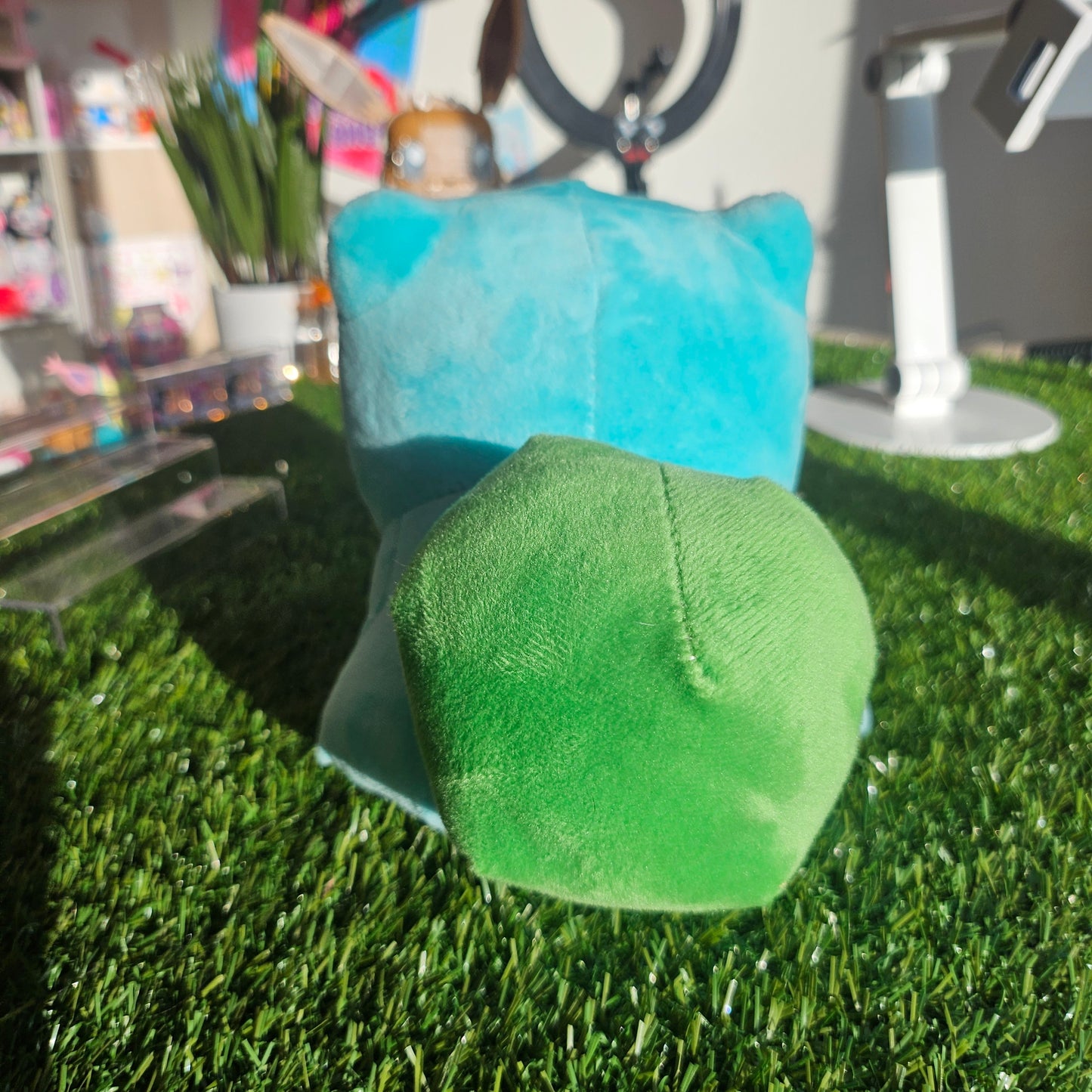 grass dino with bulb plushie