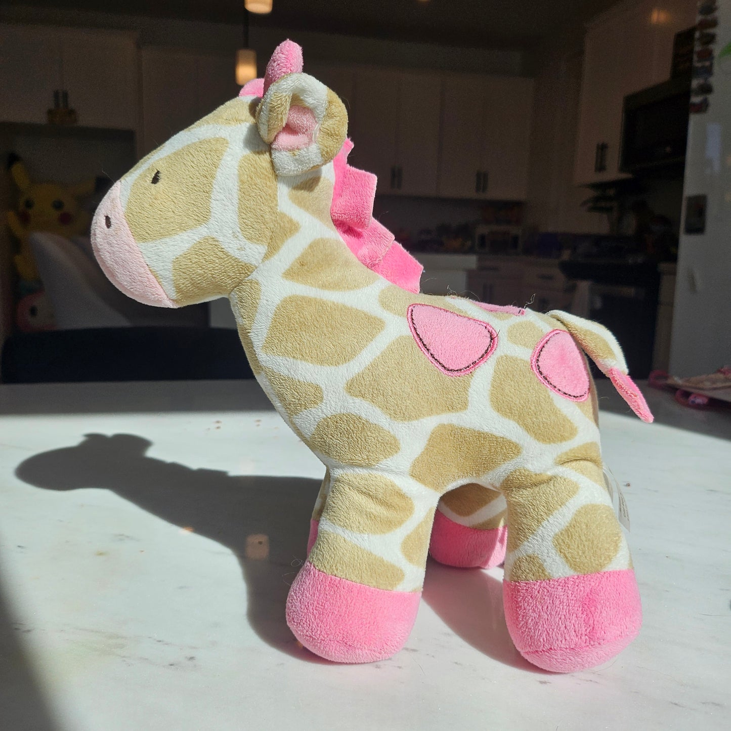 pink giraffe plushie