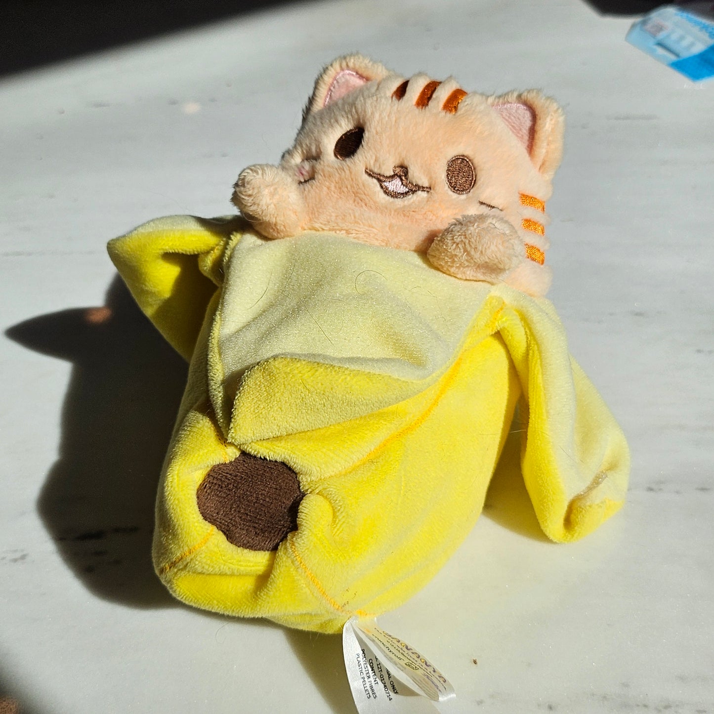 banana cat plushie (orange tabby)