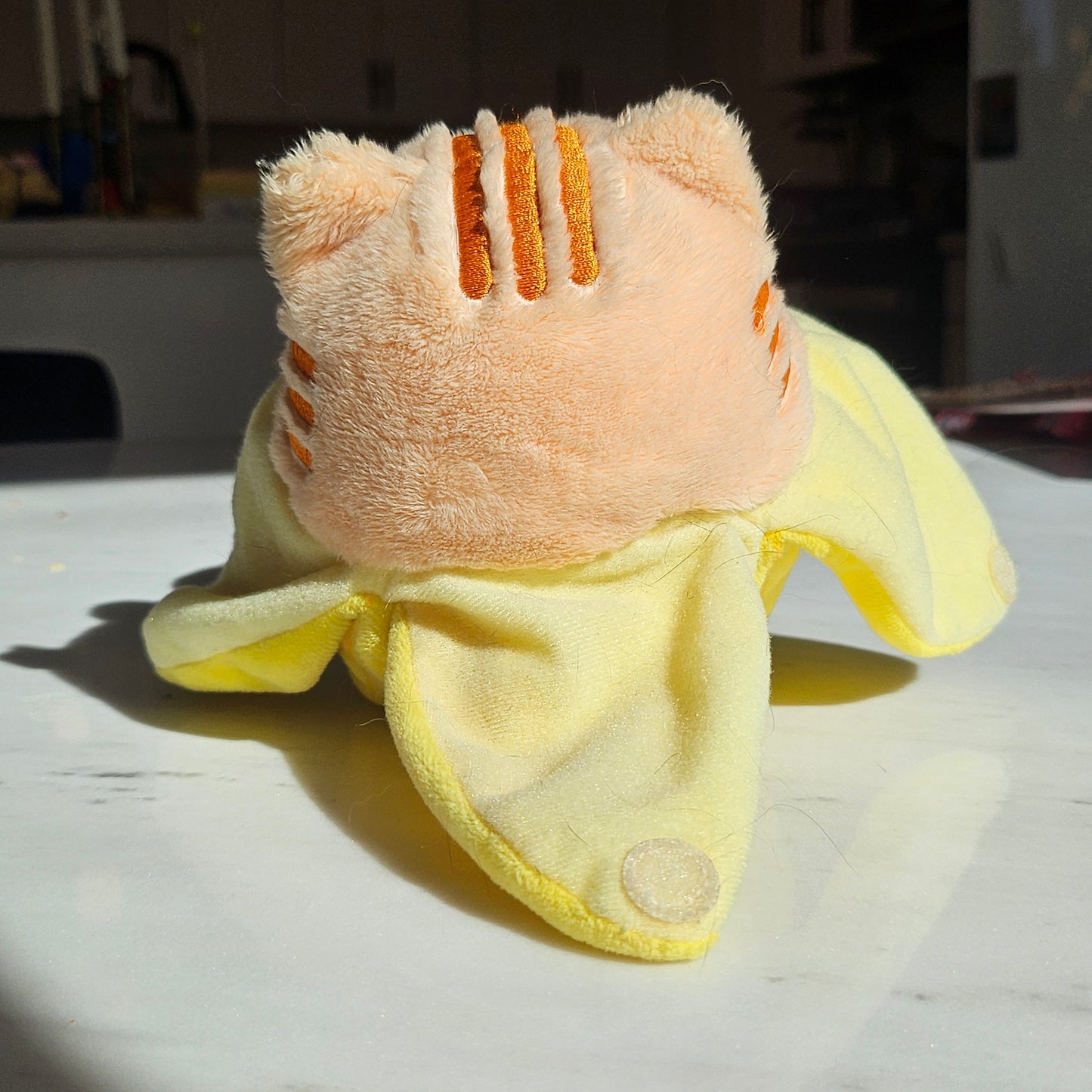banana cat plushie (orange tabby)