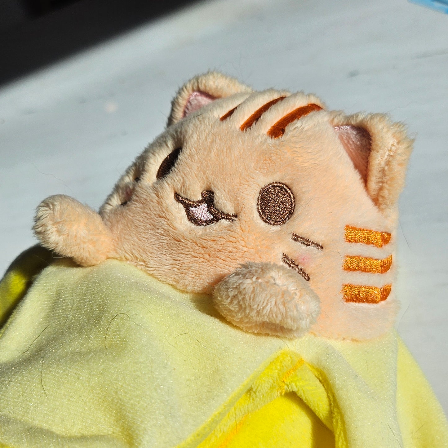 banana cat plushie (orange tabby)