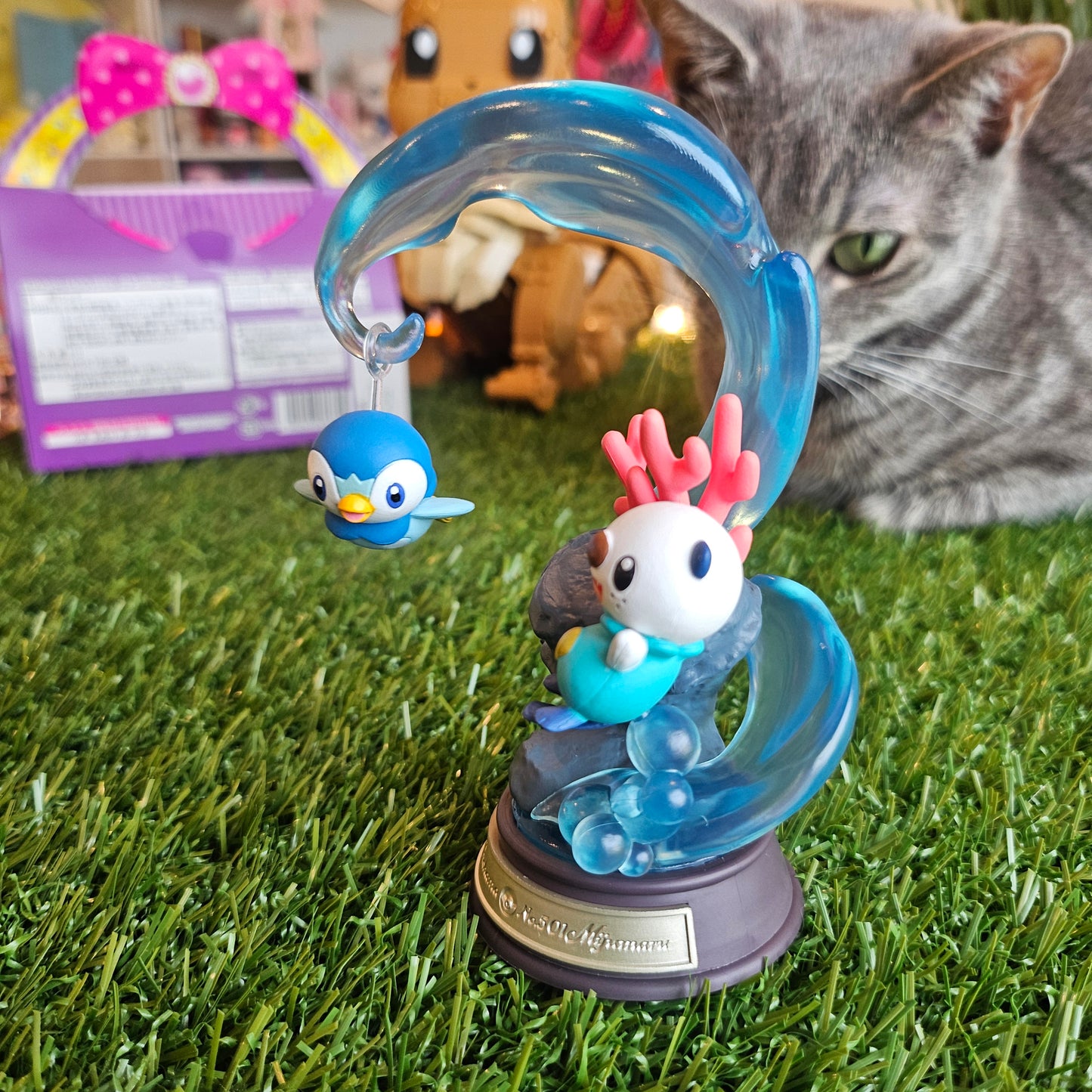 penguin and otter figure