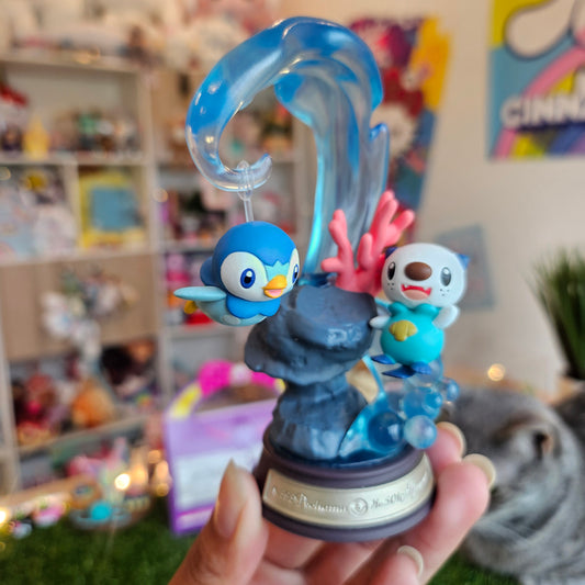 penguin and otter figure