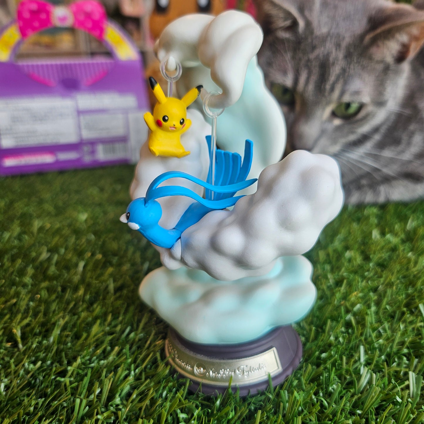 electric mouse and cloudy bird figure