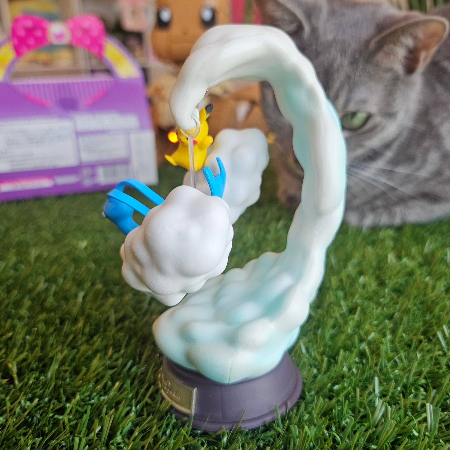 electric mouse and cloudy bird figure