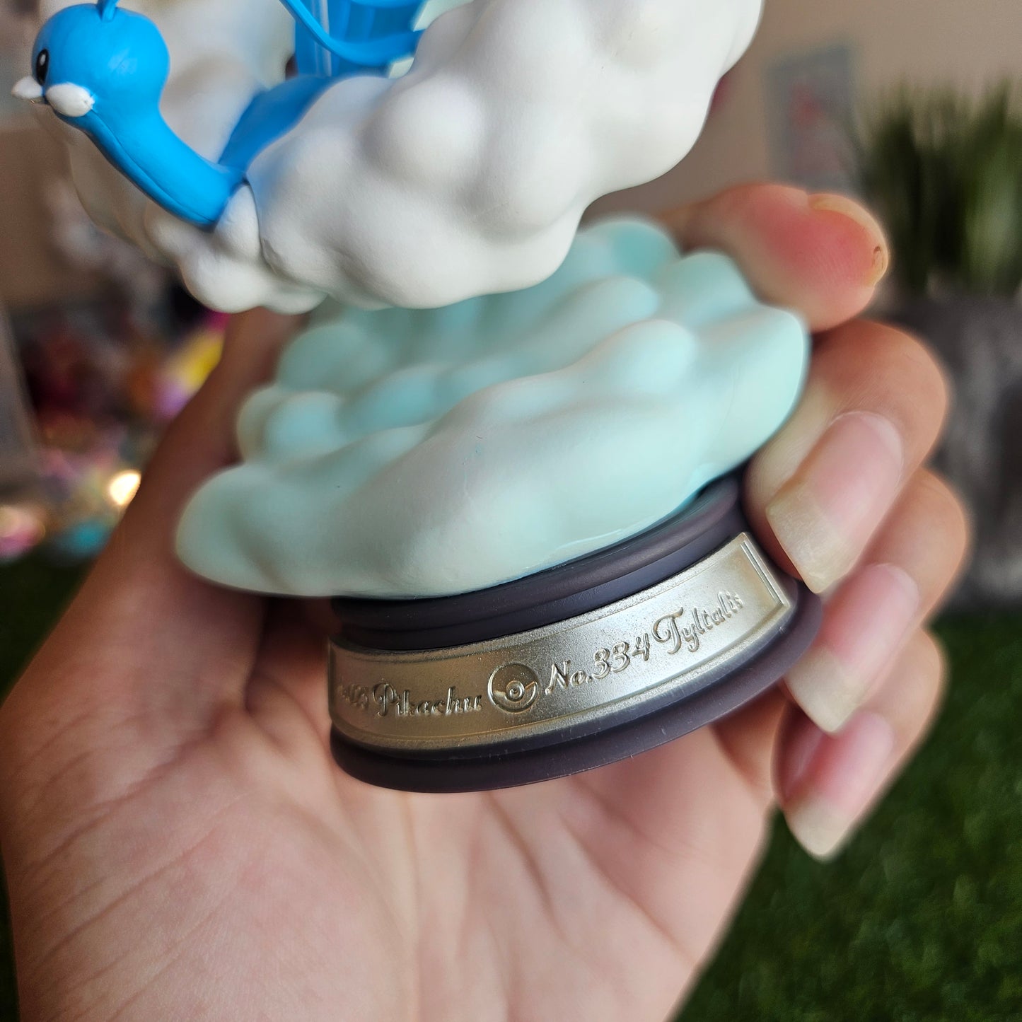 electric mouse and cloudy bird figure