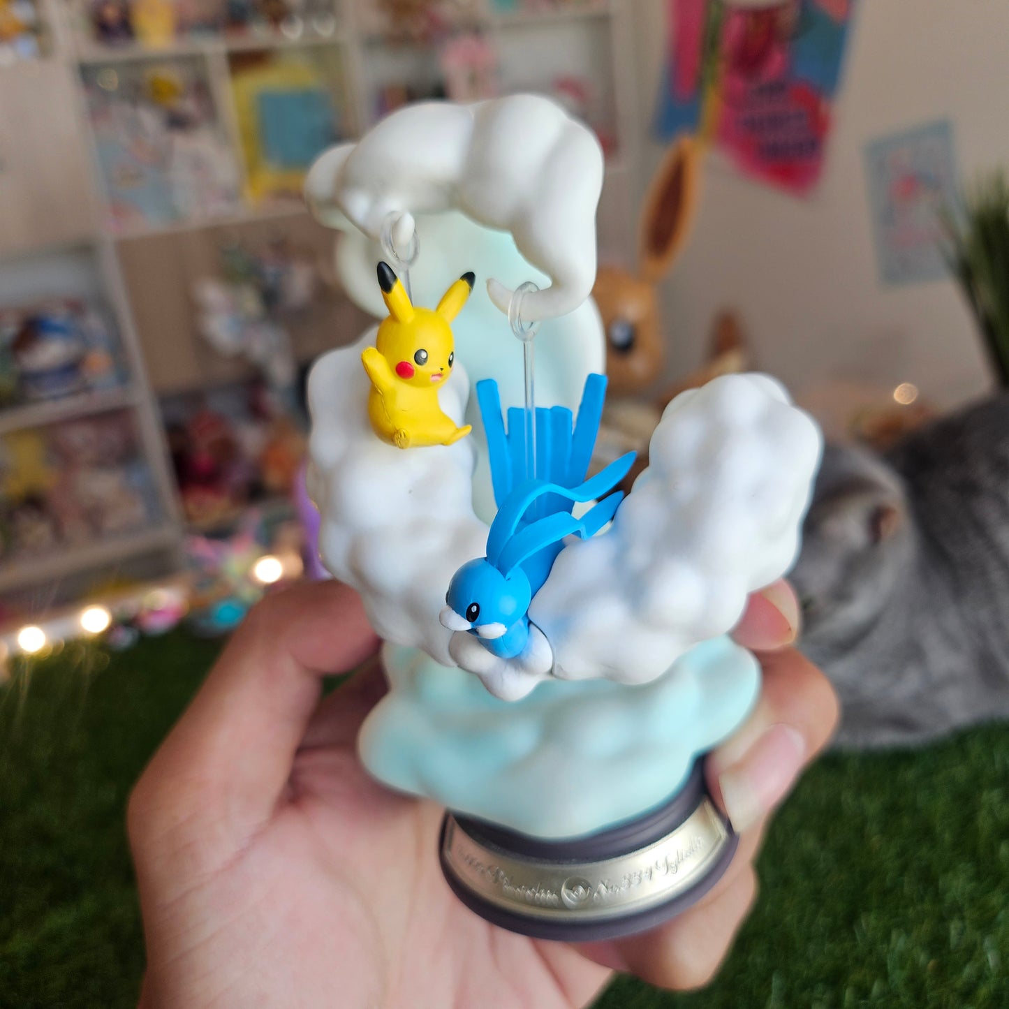 electric mouse and cloudy bird figure