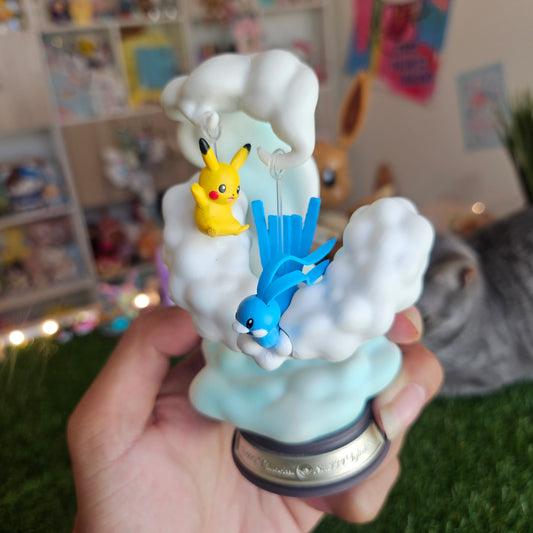 electric mouse and cloudy bird figure