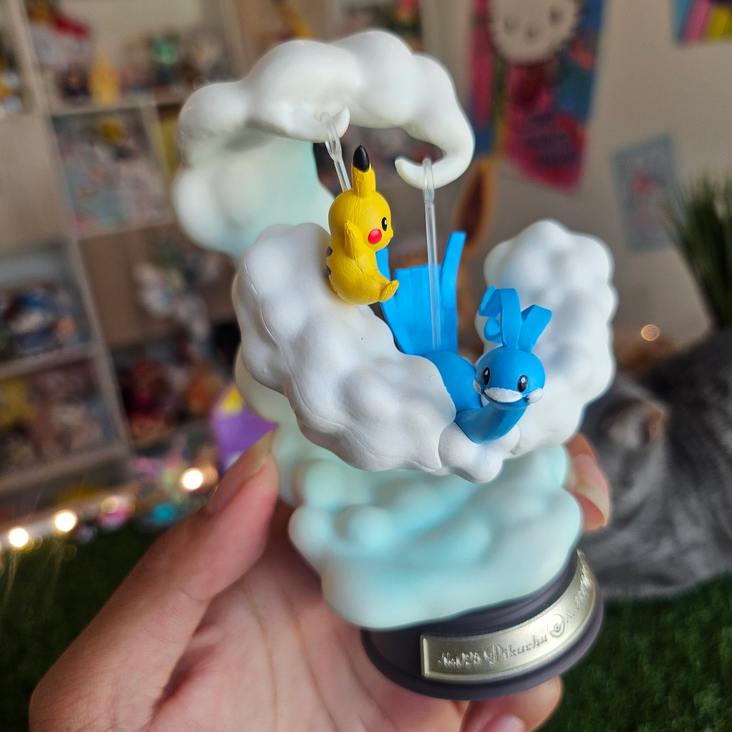electric mouse and cloudy bird figure