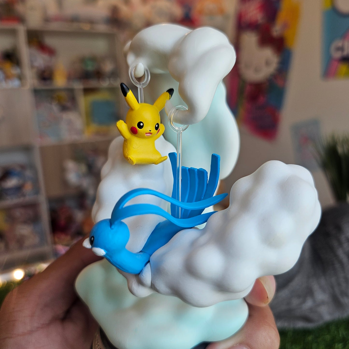 electric mouse and cloudy bird figure