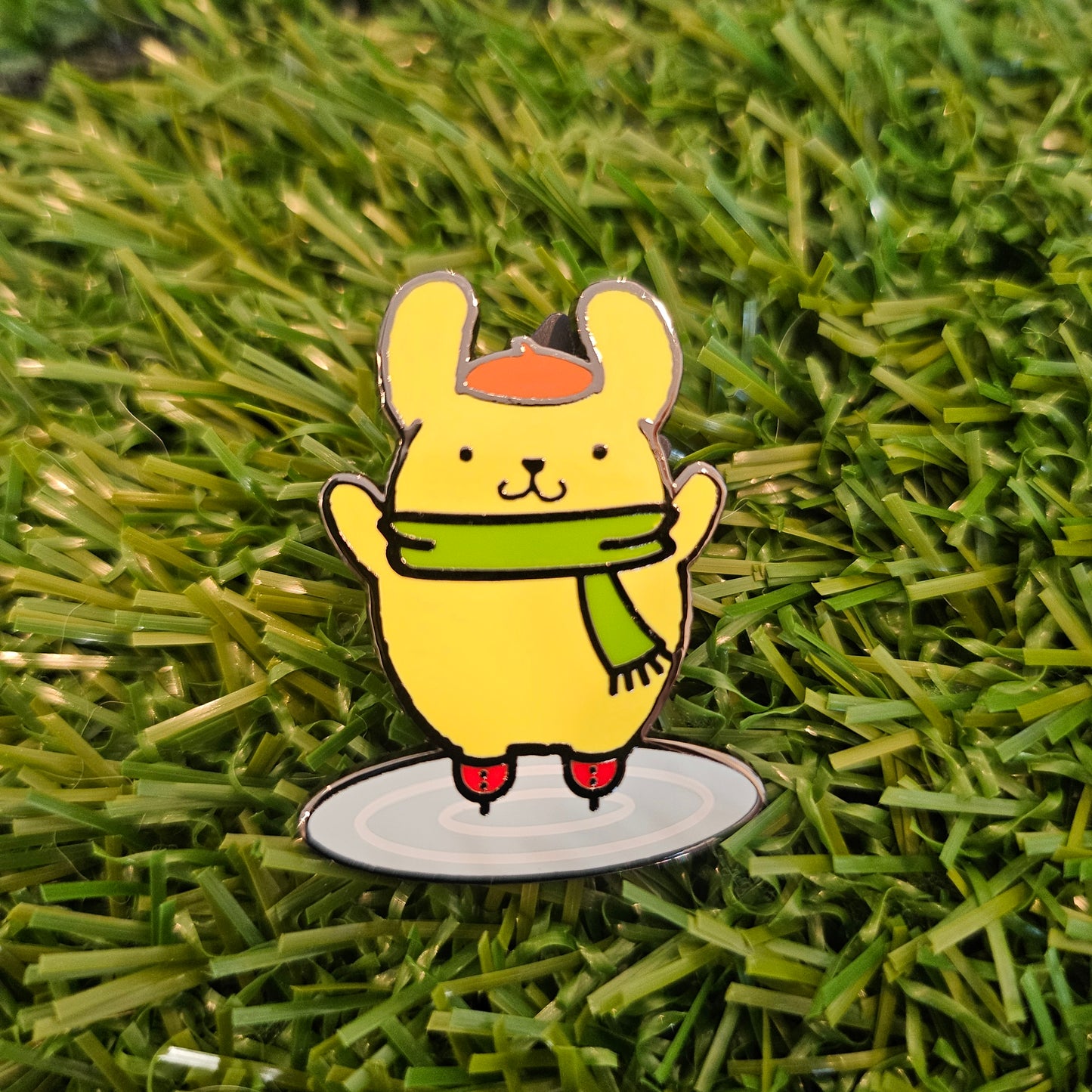pom pin (skating)