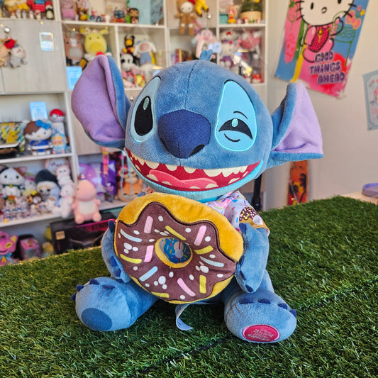 blue dog eating donut plush