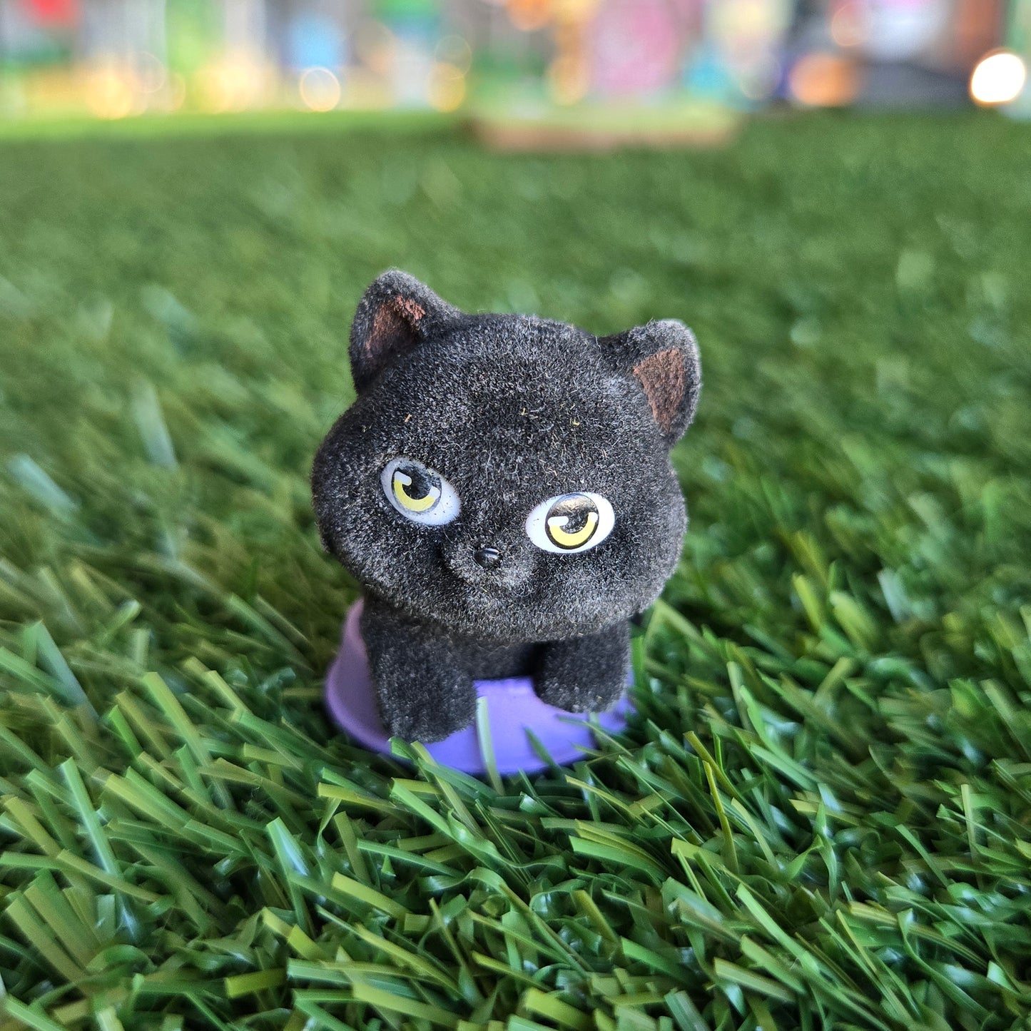 black cat in food bowl figure