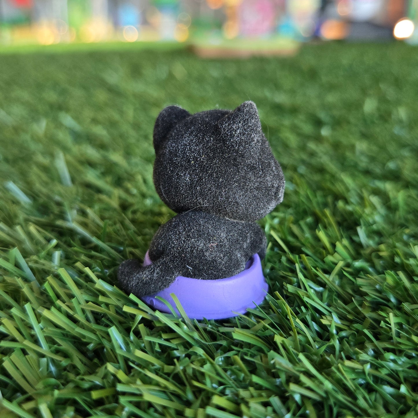 black cat in food bowl figure