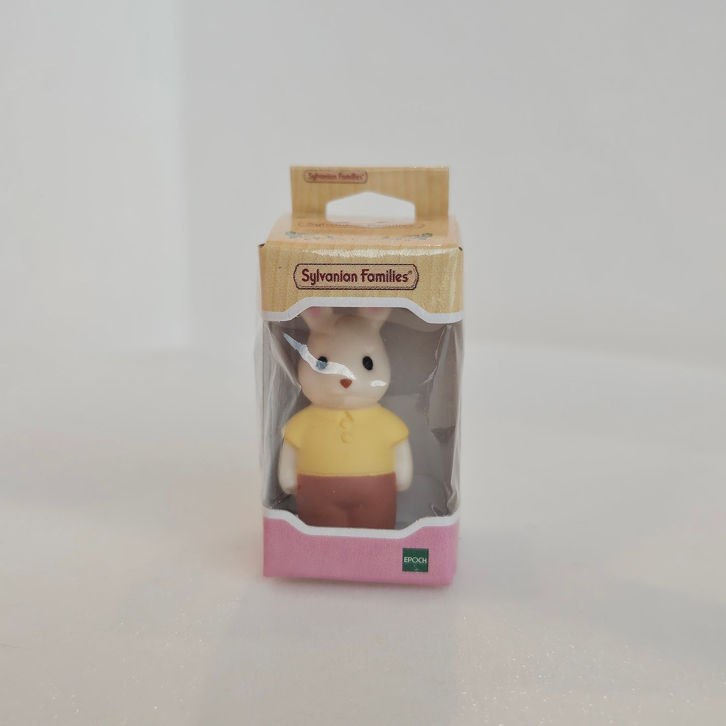 tiny bunny in box (yellow shirt)