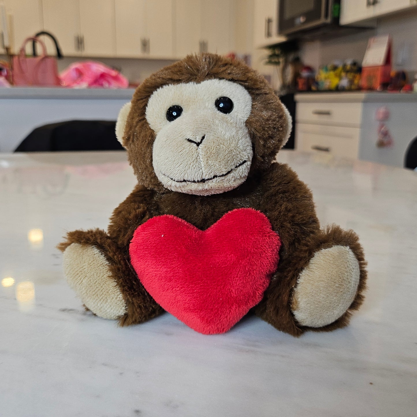 monkey with heart plushie