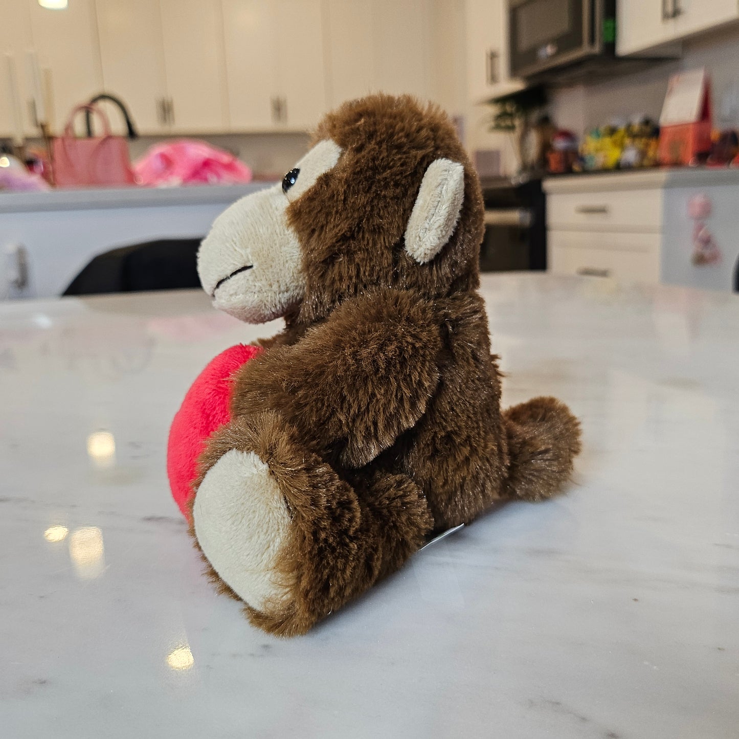 monkey with heart plushie