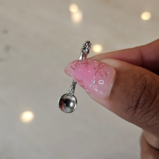 tiny silver spoon